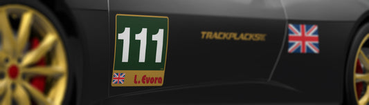 Matte black Lotus Evora with TrackPlacks racing number board installed on track